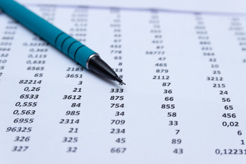 Financial accounting, Image a plurality of numbers on paper. Financial schedules.