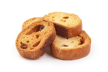 Freshly baked tasty crackers with raisins, close-up, isolated on white background