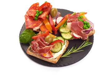 Snacks of different types of sandwiches, close-up, isolated on white background