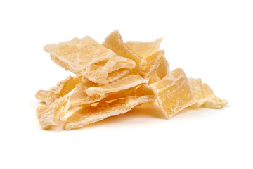 Sweet dry sugary ginger slices, close-up, isolated on white background