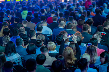 Audience listens to the lecturer at the conference