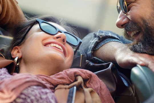 Smiling couple relaxing in car