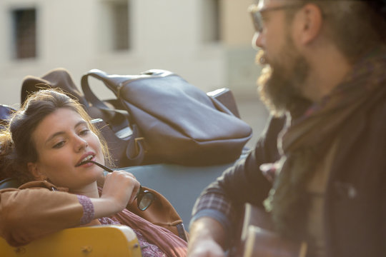 Couple relaxing in car