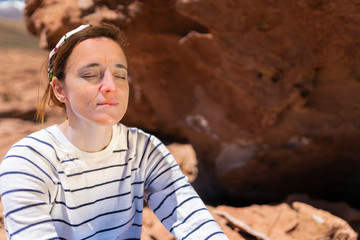 One girl enjoying a day in the outdoors at Atacama Desert in the middle of a boulder area, an awe high altitude place for traveling and have some fun in the desert with amazing landscapes
to discover