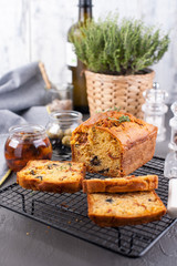 Traditional Italian bread with dried tomatoes and olives. Homemade cakes for lunch and breakfast and ingredients. Free space for text. Copy space