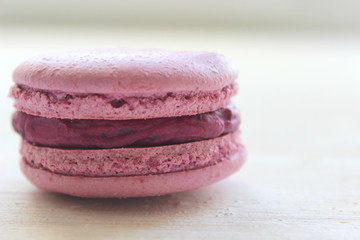 French sweet delicacy, macaroons variety close-up.Macaroons cake isolated on a light background. Copy space.