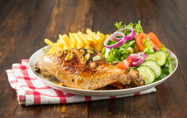 Muslos de pollo asado