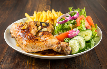 Muslos de pollo asado