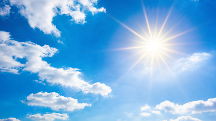 Hot summer or heat wave background, wonderful blue sky with glowing sun - 259425456