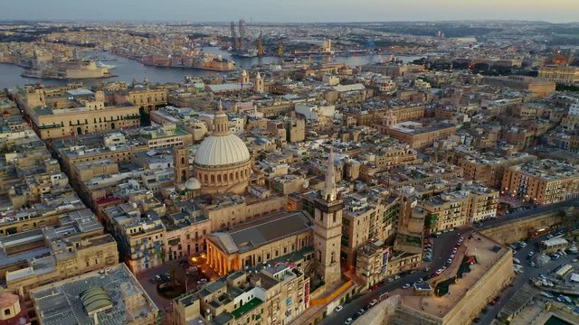 Aerial view of Valletta city in 4K. Sunset sky. Malta island