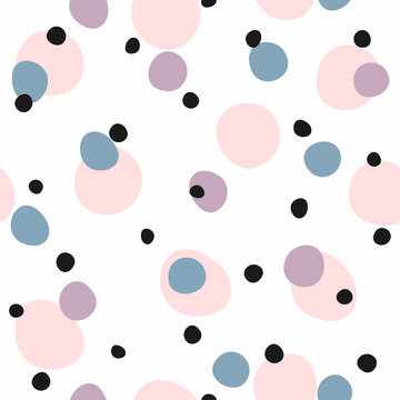 Seamless pattern with colored round spots. Abstract stylish print for children and teenagers. White, pink, purple, blue, black.