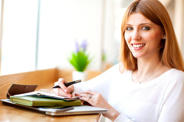 girl freelancer working in laptop in the office