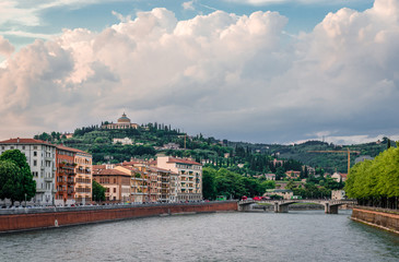 View of Verona from Ponte della Vittoria, a bridge that spans river Adige. Verona is a historic city in Veneto, Italy and a very popular tourist destination.