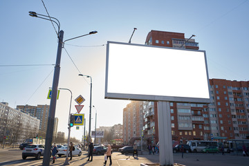 3x6 big billboard standing in the city against the sky during the daytime, with a white advertising space mockup - obrazy, fototapety, plakaty