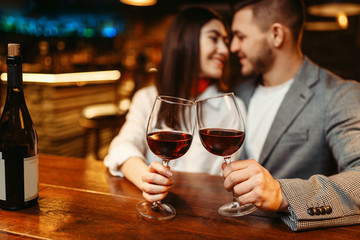 Romantic evening, couple in bar, date celebration