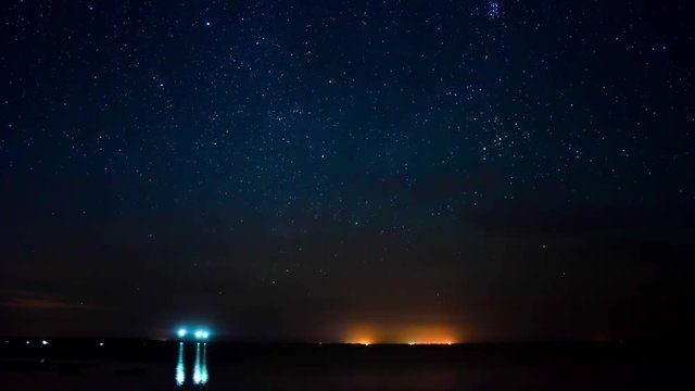 Time lapse of the starry sky over Dzharylgachsky bay which is part of Dzharylgachsky national natural park. Kherson region, Ukraine.