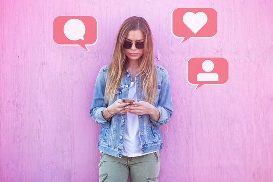 Beauty Girl Influencer Using Social Media on Smartphone with Like, Comment, Follower icon Around on Pink Background