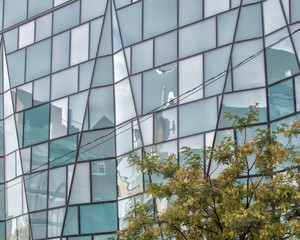 Obraz na płótnie Canvas Building with Geometric Glass Cladding
