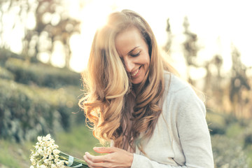 woman laughs with pleasure