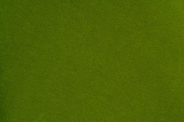 Fototapeta premium Green porous texture of fabric material background