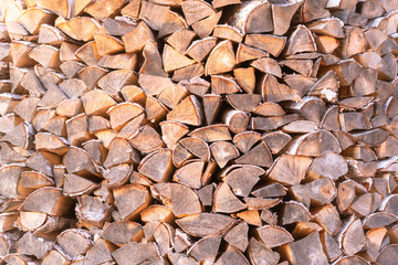 Woodpile. Firewood stacked in a woodpile. Birch wood at close range.