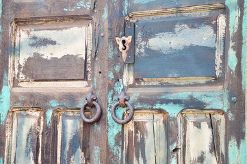 old wooden door with iron locks