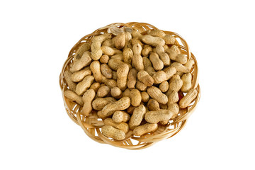 Peanuts. Dry whole nuts on bamboo plate isolated on white background without shadow.