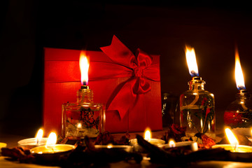Beautiful candles and gifts burning on Valentine's Day