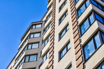 Detail of a new condomunium complex on the background of blue sky