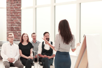 Obraz premium business woman conducting a seminar for her business team