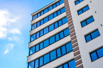 Detail of a new condomunium complex on the background of blue sky