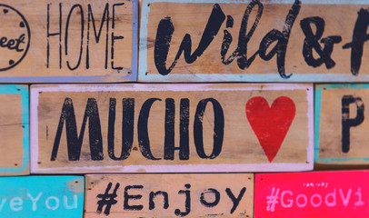 Signboard with text many love in spanish