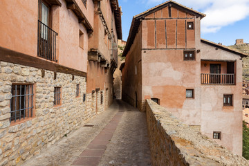 a narrow street in Albarracin town, province of Teruel, Aragon, Spain