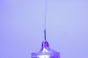 Diabetes insulin syringe with needle closeup. medicine injection