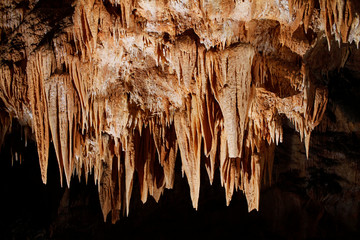 Stalactites hanging from the ceiling of the Gassel-Tropfsteinhöhle cave in Ebensee, Austria