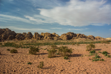 wilderness Middle East desert valley sand ground scenery landscape environment without people with bare sand stone mountain ridge horizon background