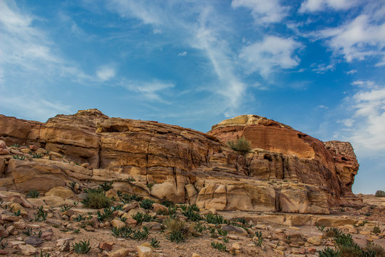 picturesque sand stone rocky wilderness outdoor environment of bare mountain ridge in colorful contrast photography from Middle East Jordan country desert