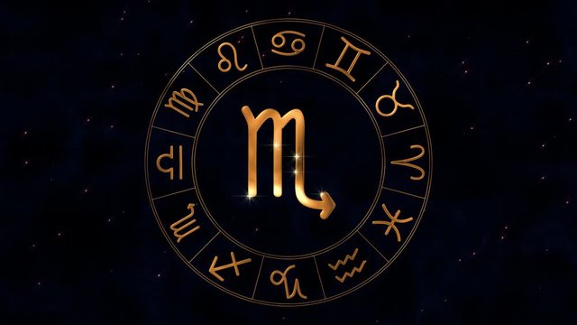 Golden zodiac horoscope spinnig wheel with Scorpio (Scorpion) sign in center