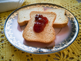 Dish with toast and jelly