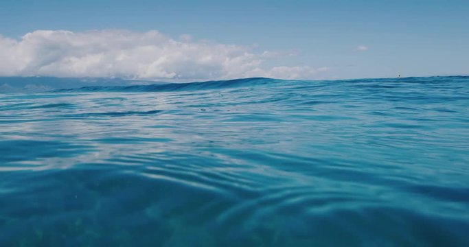 Over under shot of calm ocean