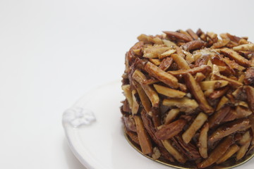 Almond Cheese cake on White Background