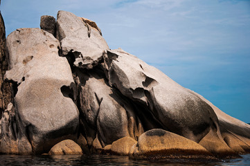 color photo of sea stones of strange abstract shape