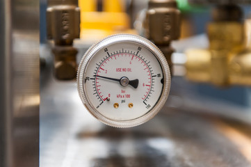 Pressure gauge isolated on blurred background