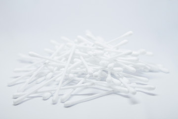 Cotton sticks buds heap isolated on white background