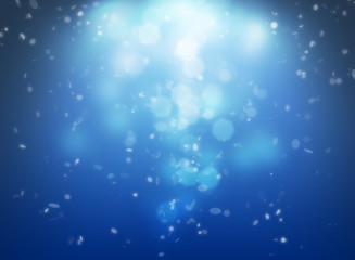 Blue glitter falling and soft light spot from middle scene