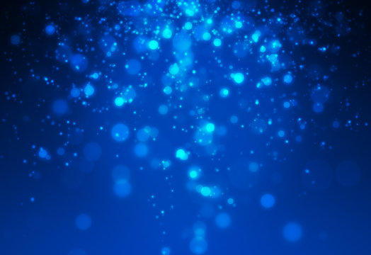 Mini glitter light with blue bokeh falling from top set on dark background