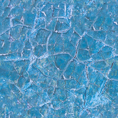 Seamless texture of a dry cracked blue paint on a metal surface. Cracks on the iron wall. Abstract background.