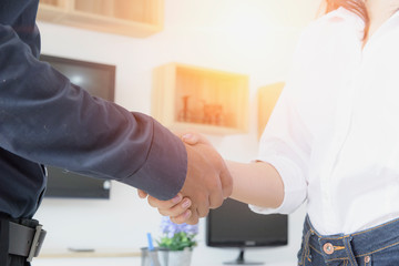Business partnership meeting concept. Image businessmans handshake. Successful businessmen handshaking after good deal. Horizontal, blurred background.
