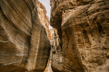 The Siq - narrow passage, gorge that leads to ancient Petra