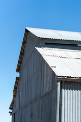 Old corrugated iron wool shed on outback station in Australia